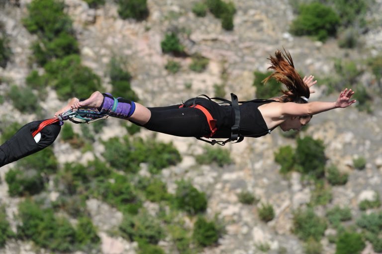 a woman doing bungee jump